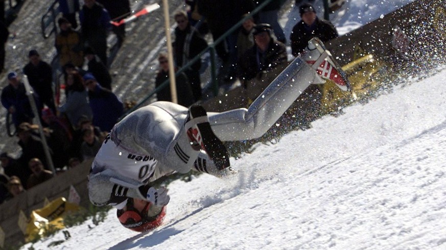 Swiss Simon Ammann crashes during the training at the Muehlenkopf ski jump in Willingen, Friday January 11, 2002, where ski jumpers are training for the world cup events this weekend. Ammann escaped t ...