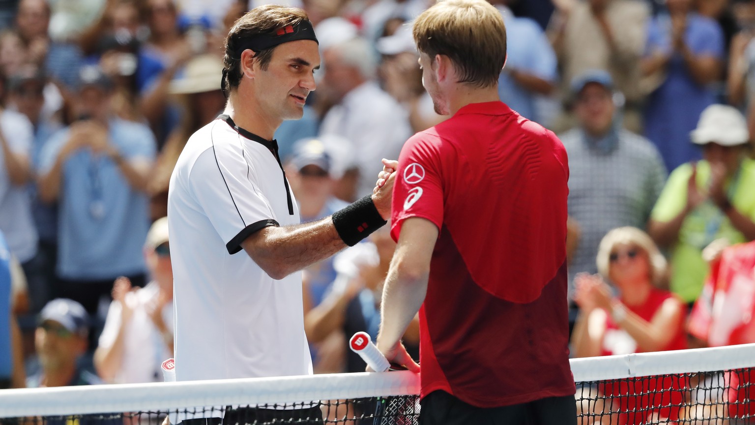 epa07811009 Roger Federer of Switzerland and David Goffin of Belgium after their match on the seventh day of the US Open Tennis Championships the USTA National Tennis Center in Flushing Meadows, New Y ...