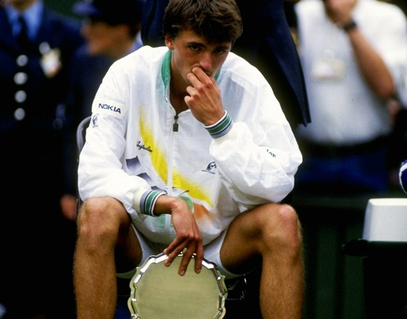 Jun-Jul 1992: Goran Ivanisevic of Croatia sits dejected after the Mens Singles final against Andre Agassi of the USA at the Lawn Tennis Championships at Wimbledon in London. Ivanisevic was defeated by ...