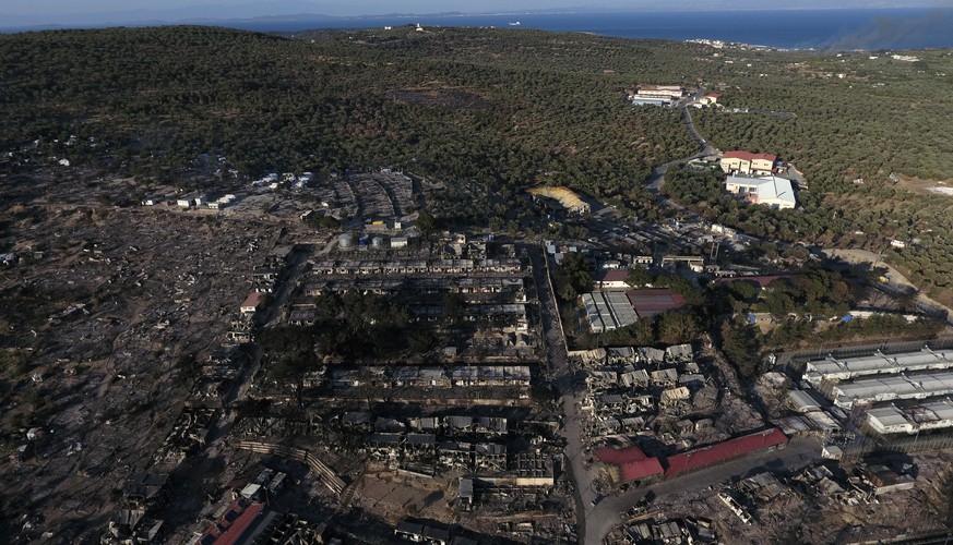 The burned Moria refugee camp is seen from above on the northeastern island of Lesbos, Greece, Thursday, Sept. 10, 2020. Little remained of Greece&#039;s notoriously overcrowded Moria refugee camp Thu ...