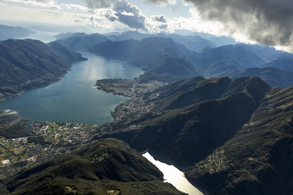 The view from the parascouts&#039; aircraft of Lago Maggiore lake, pictured near the Swiss military airbase Locarno in the canton of Ticino, Switzerland, on October 4, 2013. Within the frame of their  ...