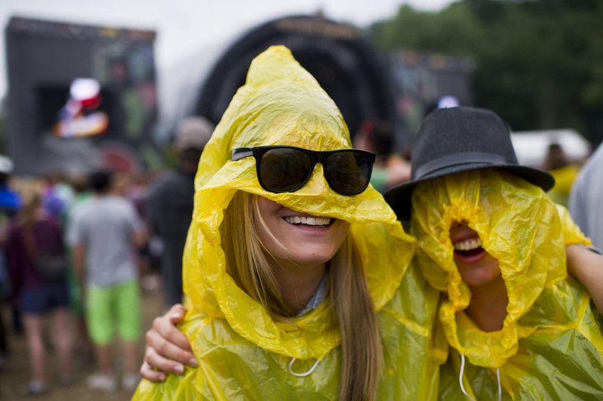Festival visitors enjoy the concert of Swiss rapper Stress during the Openair St. Gallen Festival in St. Gallen, Switzerland, Sunday, July 1, 2012. The OpenAir St. Gallen runs from June 28 to July 1,  ...