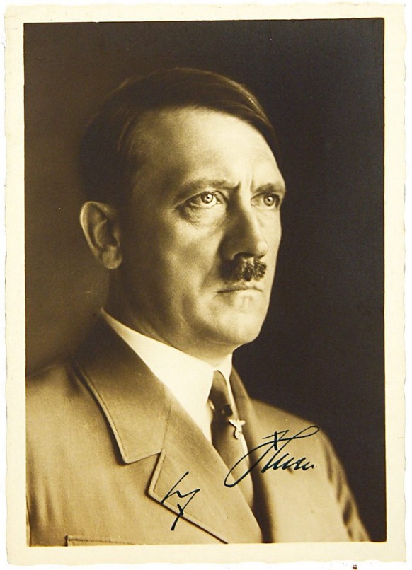 This signed portrait postcard of Adolf Hitler was sold along with a first edition of Mein Kampf at auction in London Wednesday 15th June 2005 by Bloomsbury Auctions. The book, signed by the Nazi leade ...