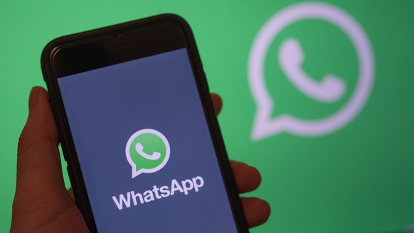 epa08186916 (FILE) - A smartphone screen displays the logo of the mobile application WhatsApp in Berlin, Germany, 31 December 2017 (reissued 02 February 2020). WhatsApp announced that it will stop wor ...