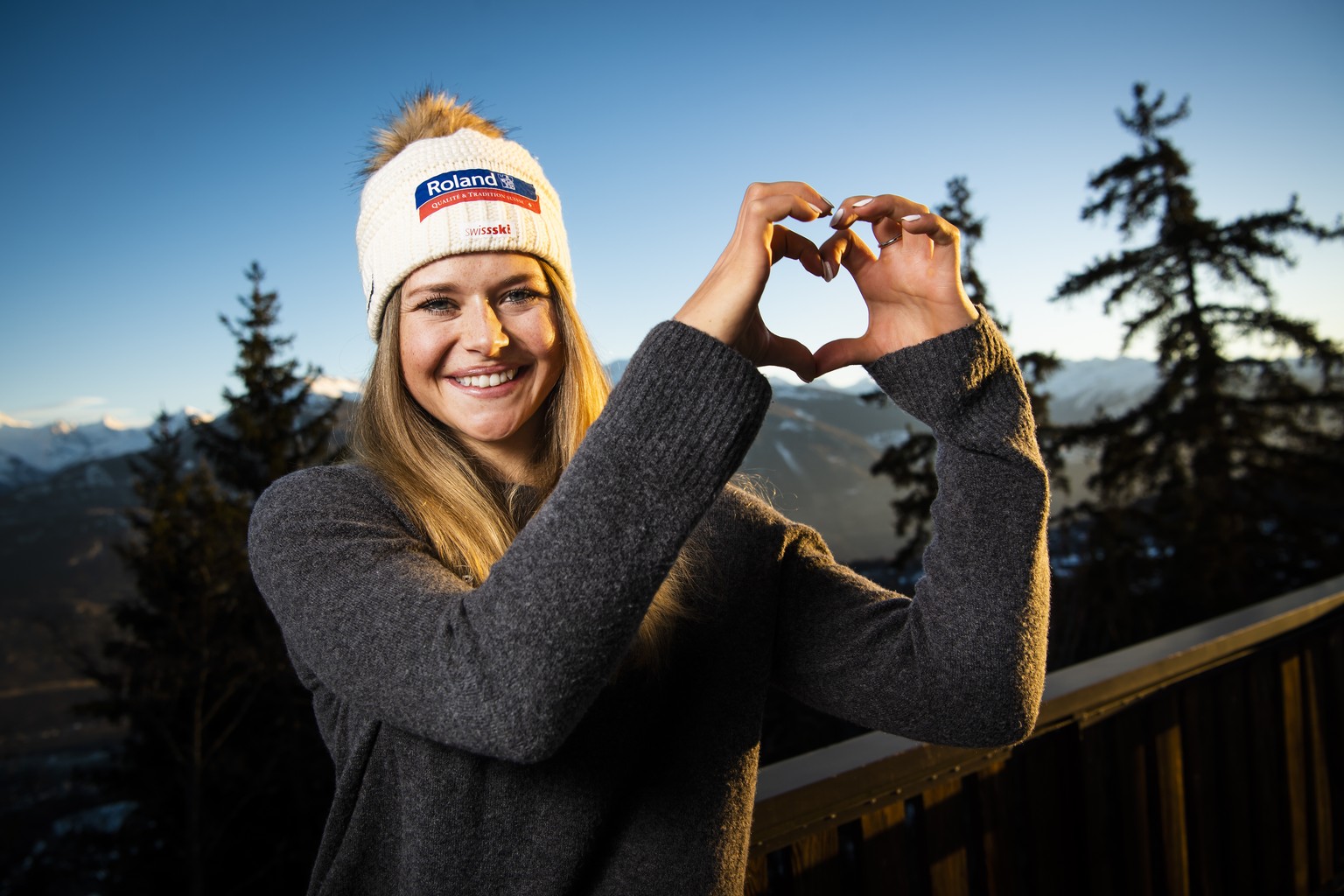 Ski racer Corinne Suter from Switzerland, poses to photographer during the Swiss-Ski federation press conference at the FIS Alpine Ski World Cup season in Crans-Montana, Switzerland, Thursday, Februar ...