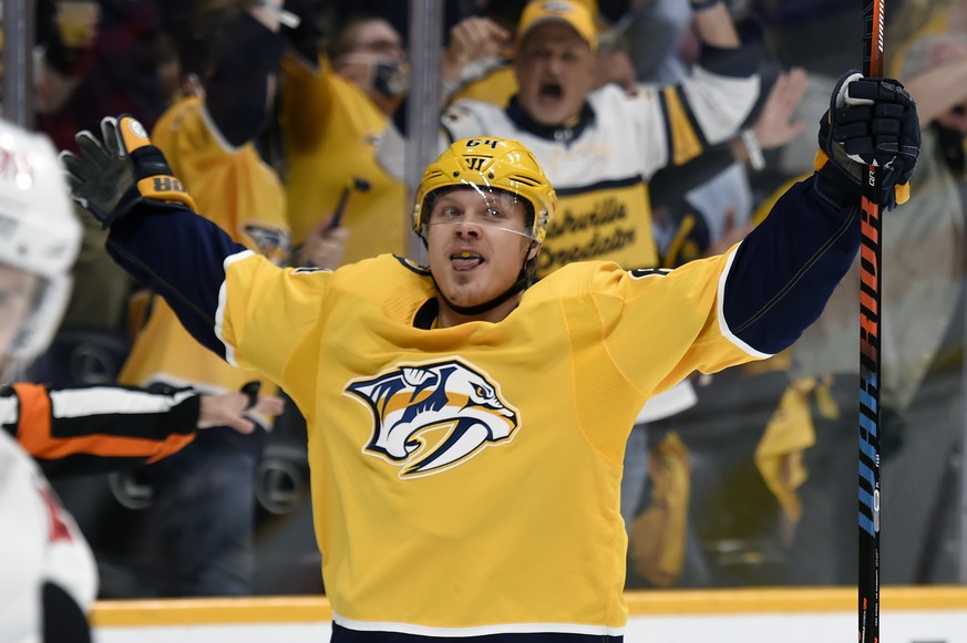 Nashville Predators center Mikael Granlund (64) celebrates after scoring a goal against the Carolina Hurricanes during the second period in Game 6 of an NHL hockey Stanley Cup first-round playoff seri ...