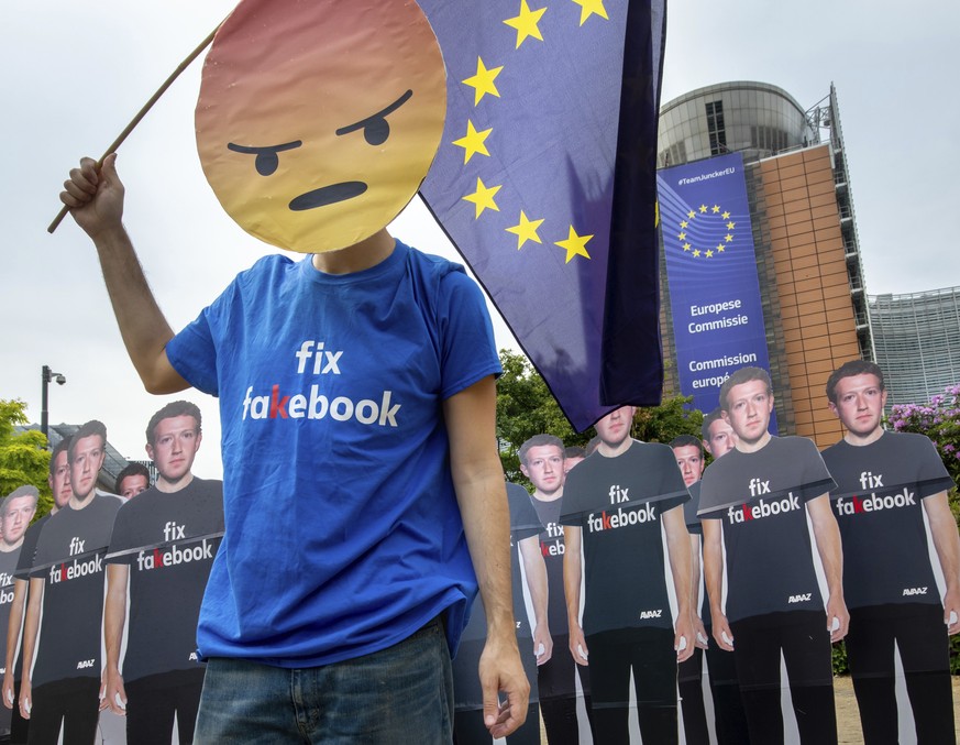 IMAGE DISTRIBUTED FOR AVAAZ - Army of fake Zuckerbergs march on EU Parliament ahead of the CEO hearing on Tuesday 22 May 2018 in Brussels. (Olivier Matthys/AP Images for AVAAZ)