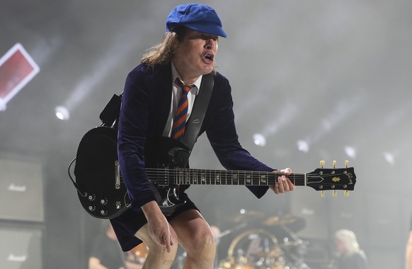 FILE - In this April 17, 2015 file photo, Angus Young of AC/DC performs at the 2015 Coachella Music and Arts Festival in Indio, Calif. AC/DC is finally heading to Spotify, three years after the vetera ...
