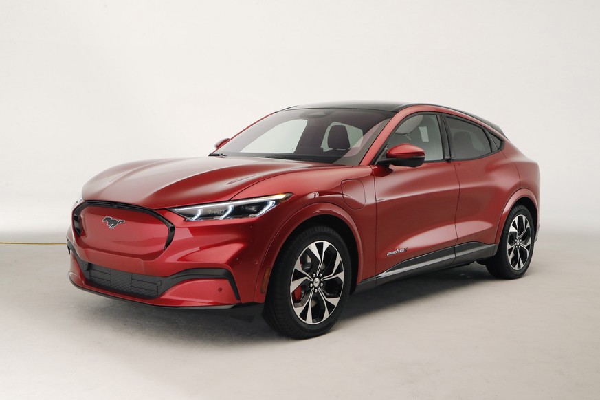 In this Wednesday, Oct. 30, 2019 photo, the new Ford Mustang Mach-E SUV is shown in Warren, Mich. Ford is hoping to score big with the electric SUV for daily drivers that sort of looks like a Mustang  ...