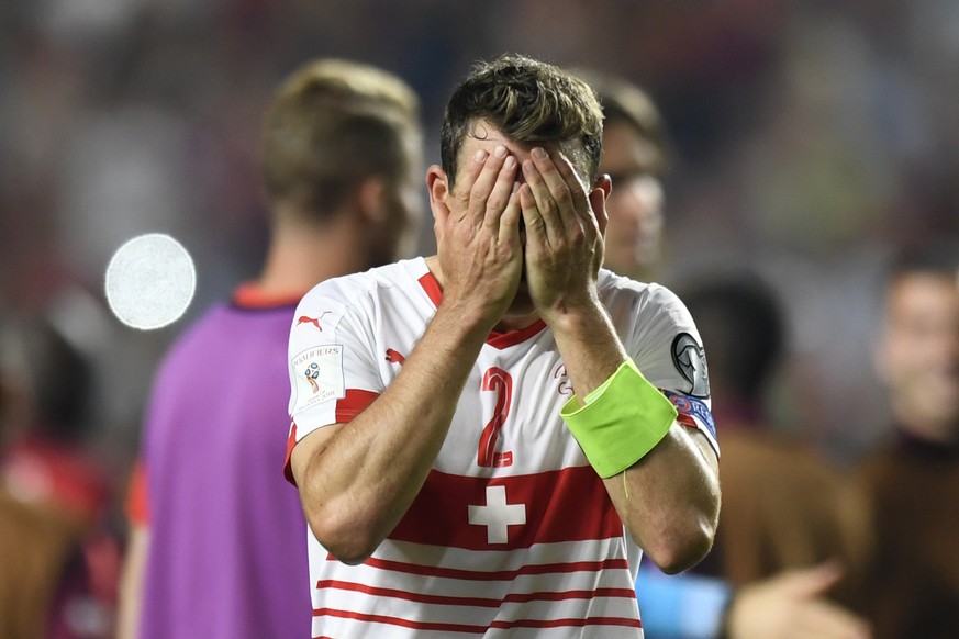Switzerland&#039;s Stephan Lichtsteiner shows dejection after the 2018 Fifa World Cup Russia group B qualification soccer match between Portugal and Switzerland at the Estadio da Luz stadium, in Lisbo ...