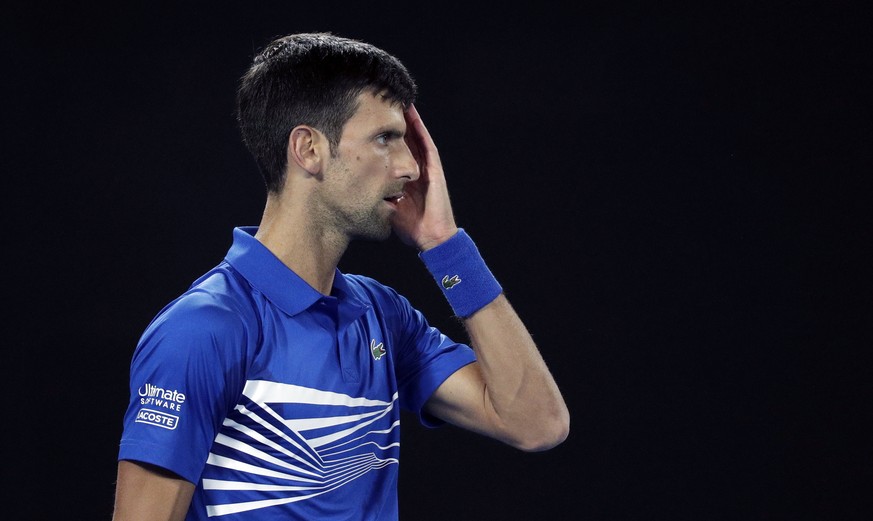 Serbia&#039;s Novak Djokovic waits to receive serve from Russia&#039;s Daniil Medvedev during their fourth round match at the Australian Open tennis championships in Melbourne, Australia, Monday, Jan. ...