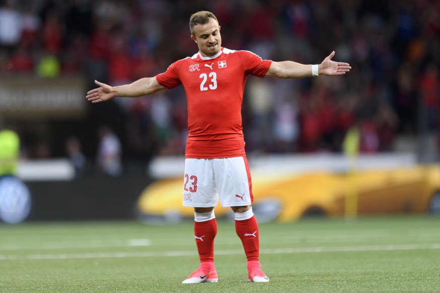 Swiss forward Xherdan Shaqiri celebrates his goal after scoring the firt goal during a friendly soccer match on the side line of the 2018 Fifa World Cup group B qualification between Switzerland and B ...