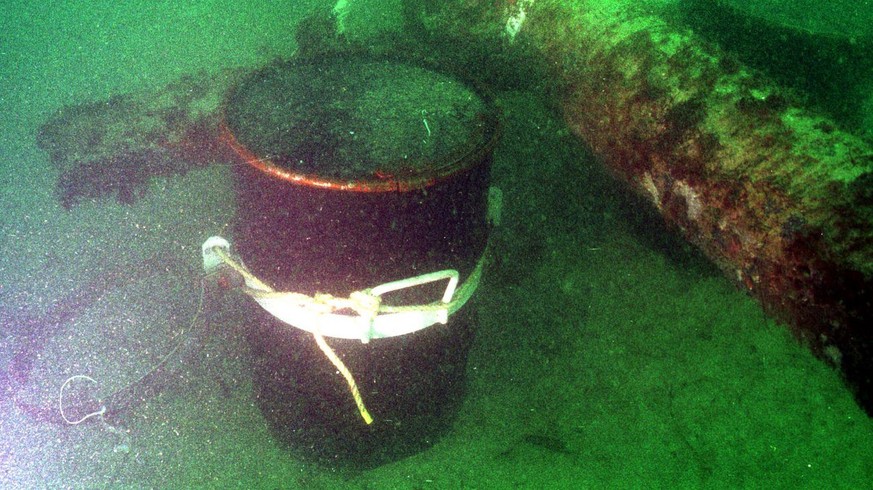 Picture taken 14 September off Cap de la Hague, France, and released by Greenpeace showing two nuclear wastes drums stored by Cogema nuclear reprocessing company 250 meters off a public beach in seven ...
