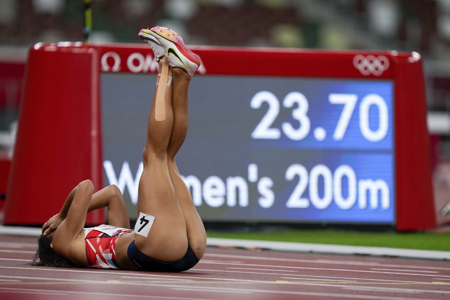 Katarina Johnson-Thompson, of Britain, reacts after falling during a heat in the heptathlon women&#039;s 200-meter at the 2020 Summer Olympics, Wednesday, Aug. 4, 2021, in Tokyo. (AP Photo/Martin Meis ...
