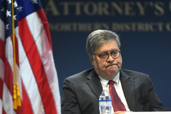 epa08687064 US Attorney General Bill Barr listens as he and Advisor to the President Ivanka Trump meet with federal officials and stakeholders at the U.S. Attorney&#039;s Office for the Northern Distr ...