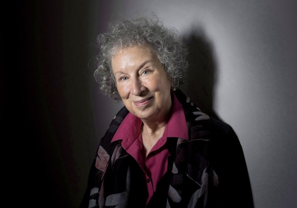 FILE - In this June 9, 2015 file photo, author Margaret Atwood poses to promote her novel, &quot;The Heart Goes Last&quot; in Toronto. Atwood, marvels at how her 1985 novel, “The Handmaid’s Tale,” has ...