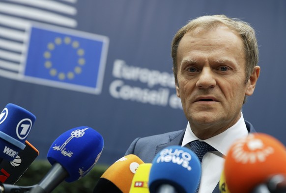 European Union Council President Donald Tusk speaks to media reporters as he arrives for the EU summit in Brussels, Thursday, Oct. 20, 2016. British Prime Minister Theresa May will hold her first talk ...