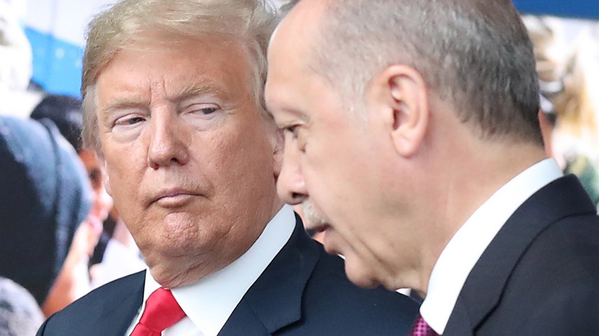 epa06943382 (FILE) - US President Donald J. Trump (L) looks at Turkey&#039;s President Recep Tayyip Erdogan (R) at NATO headquarters in Brussels, Belgium, 11 July 2018 (reissued 11 August 2018). Turki ...