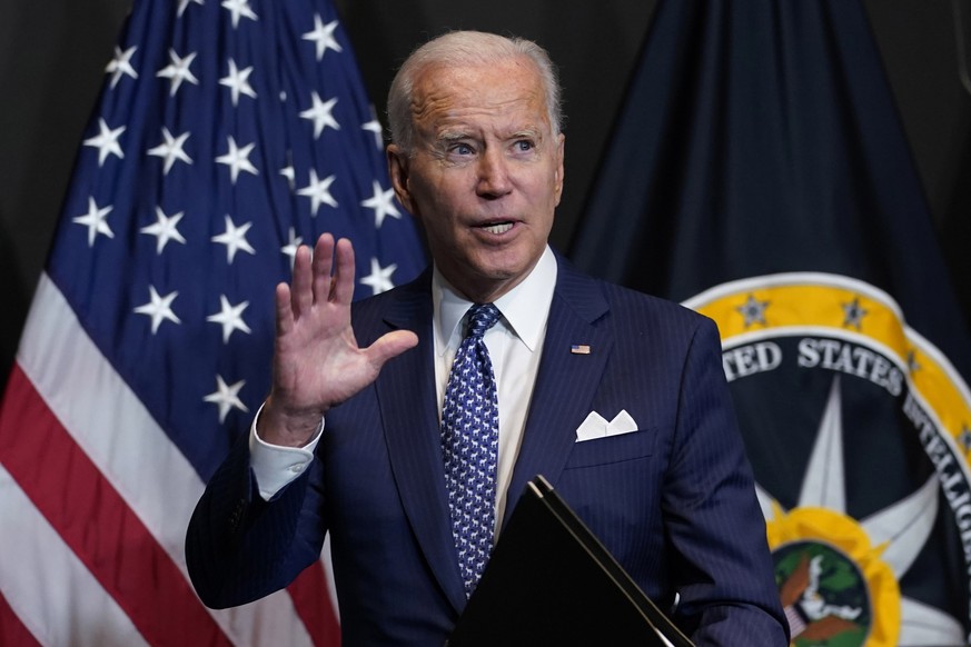President Joe Biden finishes leaves after speaking during a visits to the Office of the Director of National Intelligence in McLean, Va., Tuesday, July 27, 2021. This is Biden&#039;s first visit to an ...