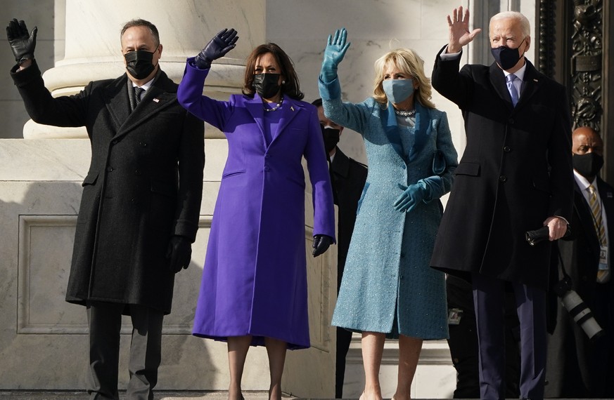 President-elect Joe Biden, his wife Jill Biden and Vice President-elect Kamala Harris and her husband Doug Emhoff arrive at the steps of the U.S. Capitol for the start of the official inauguration cer ...