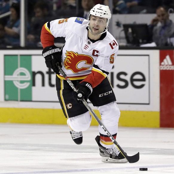 File-This March 24, 2019, file photo shows Calgary Flames&#039; Mark Giordano (5) during the first period of an NHL hockey game against the San Jose Sharks in San Jose, Calif. Giordano has had a caree ...