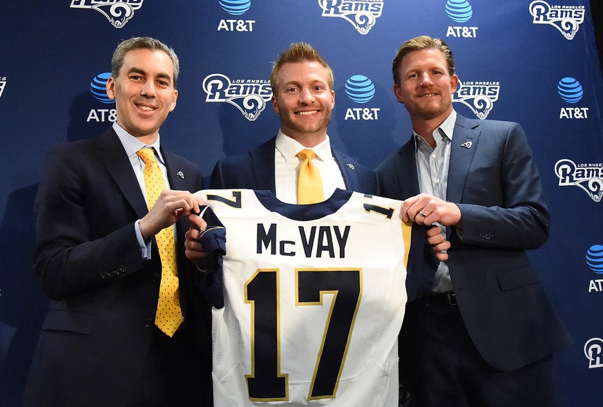 Jan 13, 2017; Los Angeles, CA, USA; L-R: Los Angeles Rams chief operating officer Kevin Demoff , head coach Sean McVay and general manager Les Snead pose for a photo during today&#039;s press conferen ...