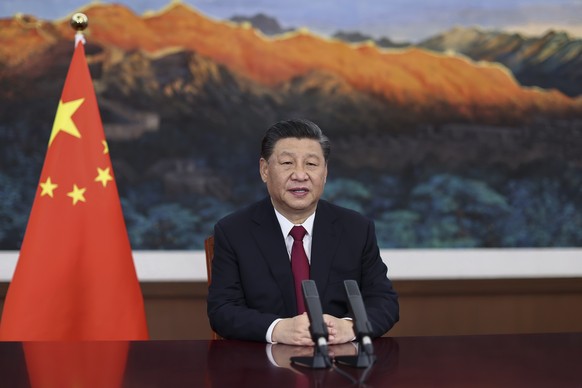 In this photo released by Xinhua News Agency, Chinese President Xi Jinping delivers a keynote speech via video for the opening ceremony of the Boao Forum for Asia (BFA) Annual Conference, in Beijing T ...