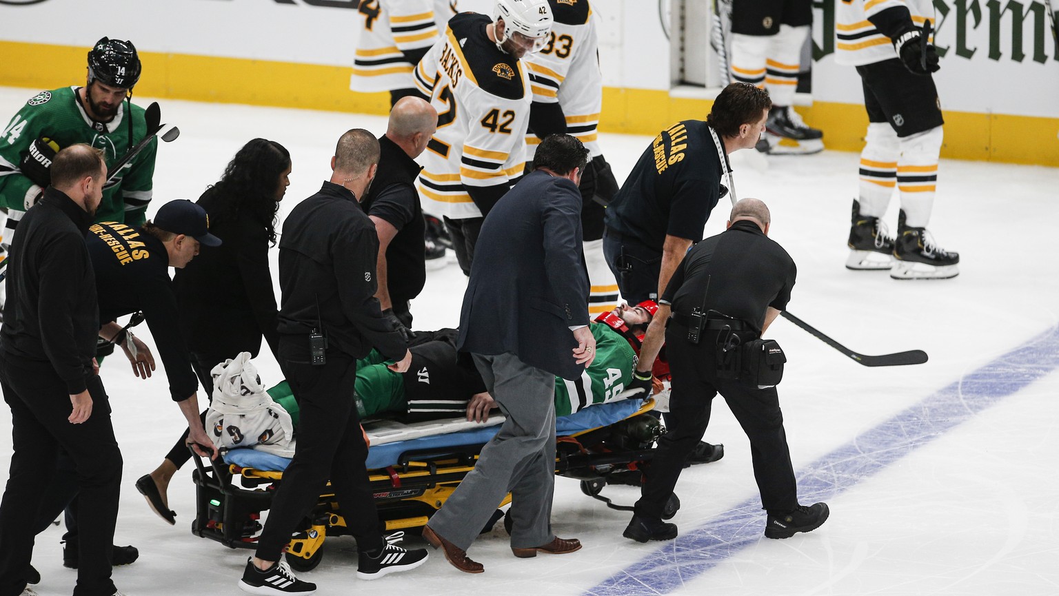 Dallas Stars defenseman Roman Polak (45) is taken off the ice on a stretcher after going head-first into the boards during the second period of the team&#039;s NHL hockey game against the Boston Bruin ...