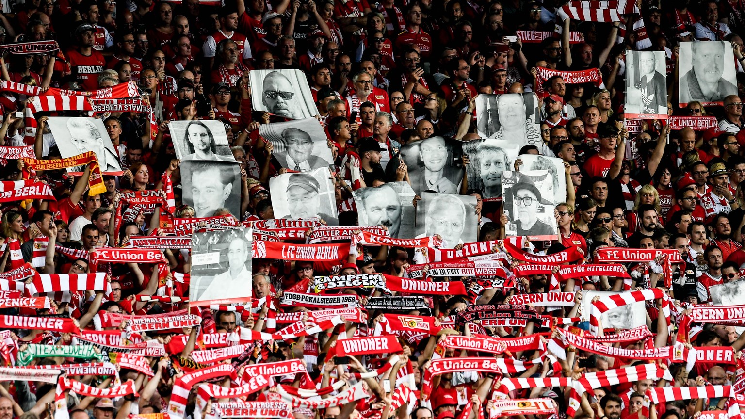 epa07779535 Union&#039;s fans players cheer prior the German Bundesliga soccer match between FC Union Berlin and RB Leipzig in Berlin, Germany, 18 August 2019. EPA/HAYOUNG JEON CONDITIONS - ATTENTION: ...