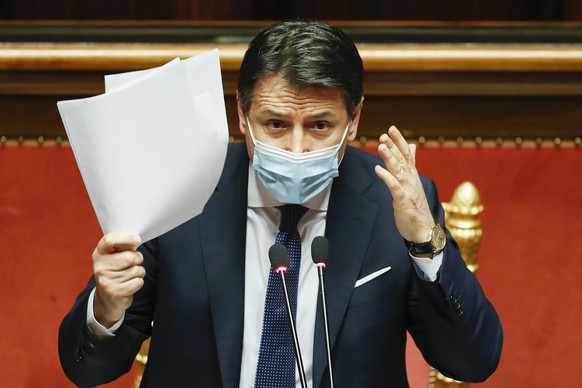 Italian Prime Minister Giuseppe Conte speaks during his final address at the Senate prior to a confidence vote, in Rome, Tuesday, Jan. 19, 2021. Italian Premier Giuseppe Conte fights for his political ...