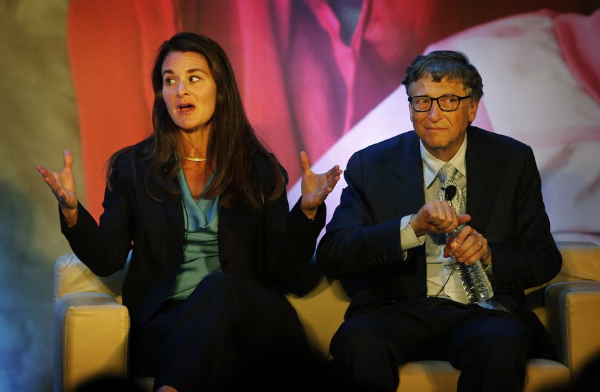 FILE - In this Sep. 16, 2019 file photo, Melinda Gates, left, talks to Indian author Chetan Bhagat, unseen, as Bill Gates looks at the audience during an interaction organized by the Bill and Melinda  ...