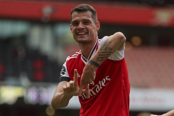 Arsenal&#039;s Granit Xhaka celebrates after scoring his side second goal during the English Premier League soccer match between Arsenal and Norwich City at the Emirates Stadium in London, England, We ...