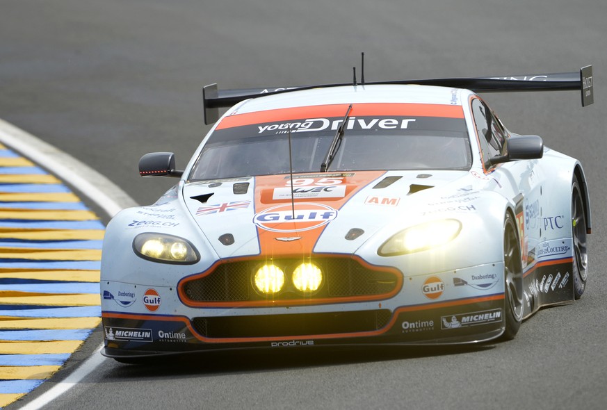 The Aston Martin Vantage GTE driven by Allan Simonsen of Denmark, is seen in action during the 90th 24-hour Le Mans endurance race, in Le Mans, western France, Saturday, June 22, 2013. (AP Photo/Miche ...