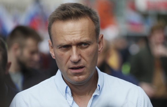 epa08641528 (FILE) - Russian Opposition activist Alexei Navalny attends a rally in support of opposition candidates in the Moscow City Duma elections in downtown of Moscow, Russia, 20 July 2019 (reiss ...