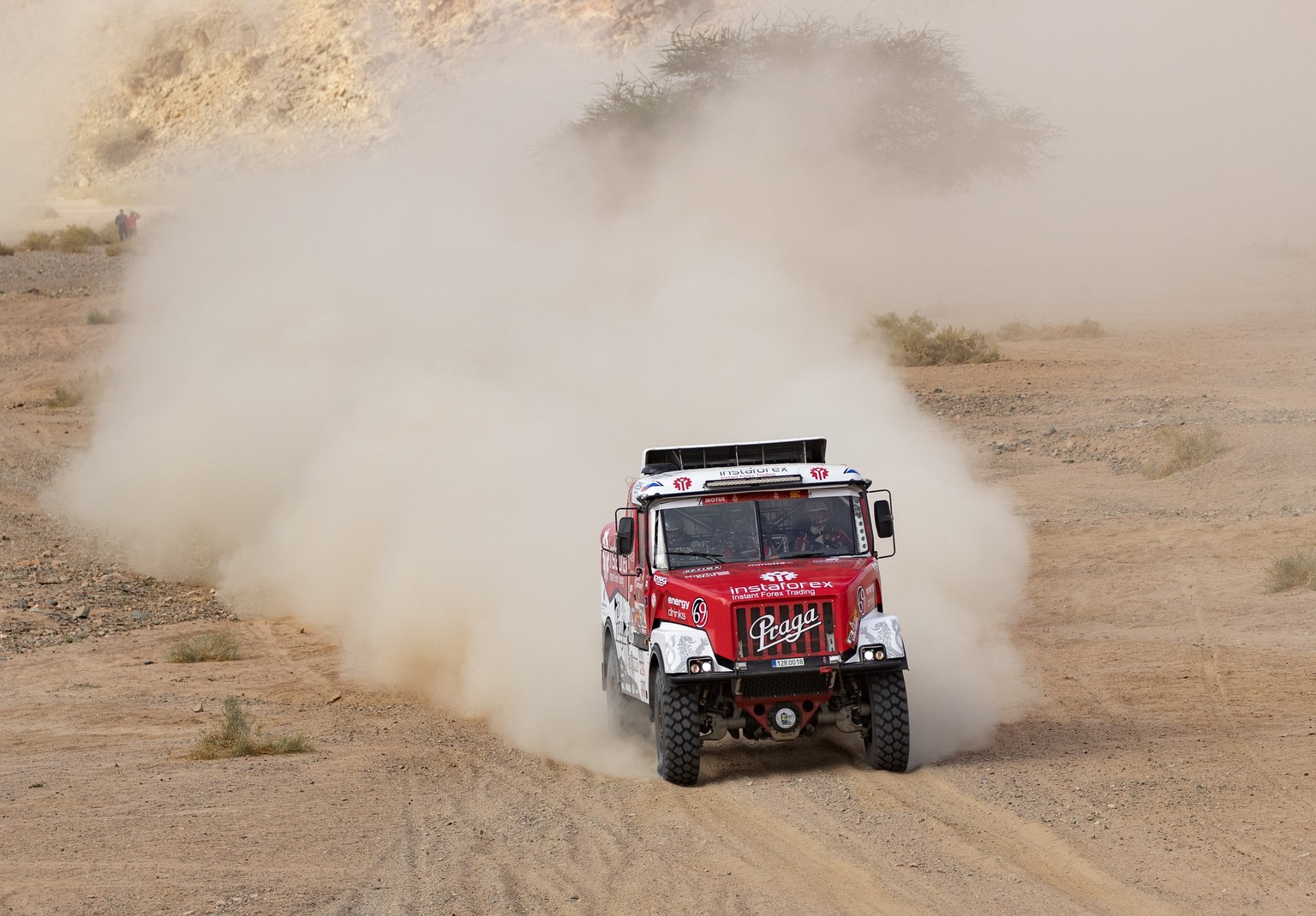 epa08112476 Czech driver Ales Loprais, co-driver Petr Pokora and Mechanic Khalid Alkendi from UAE (instaforex Loprais Team) in action during stage four of the Rally Dakar 2020 between Neom and Al Ula  ...