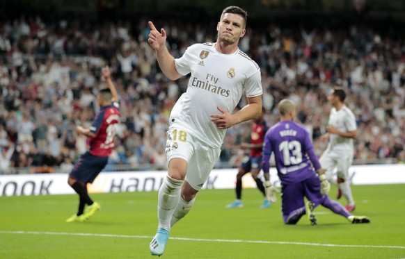 Real Madrid&#039;s Luka Jovic celebrates a goal chalked off due to a correct offside call, during the Spanish La Liga soccer match between Real Madrid and Osasuna at the Santiago Bernabeu stadium in M ...