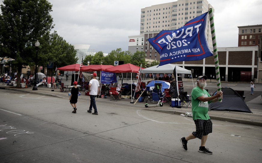 Mike Pellerin joins other Trump supporters on 4th Street and Cheyenne Ave. in downtown Tulsa, Okla., ahead of President Donald Trump&#039;s Saturday&#039;s campaign rally Friday, June 19, 2020. (Mike  ...