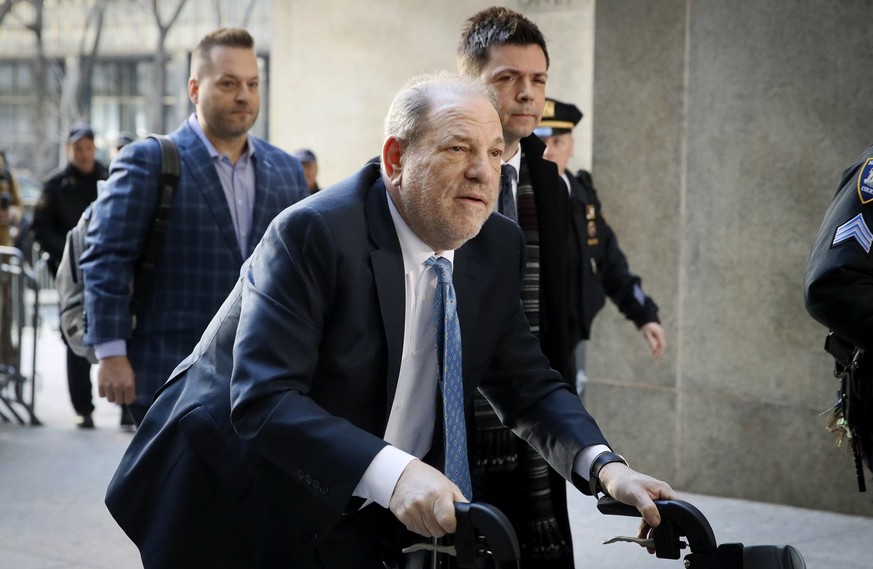 FILE - In this Feb. 24, 2020, file photo, Harvey Weinstein arrives at a Manhattan courthouse as jury deliberations continue in his rape trial in New York. Weinstein and his former studio