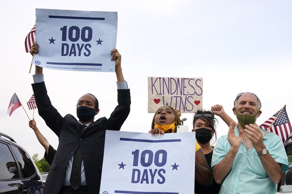 People cheer as President Joe Biden speaks during a rally at Infinite Energy Center, to mark his 100th day in office, Thursday, April 29, 2021, in Duluth, Ga. (AP Photo/Evan Vucci)
Joe Biden