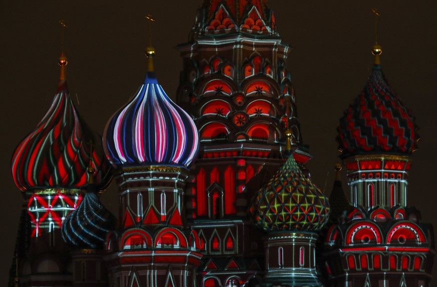 epa06163470 St. Basil Cathedral on the Red Square is illuminated during the general rehearsal for the Spasskaya Tower International Military Music Festival on Moscow&#039;s Red Square, Russia, 25 Augu ...