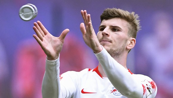 Leipzig&#039;s Timo Werner celebrates after scoring the opening goal during the German Bundesliga soccer match between RB Leipzig and SC Freiburg in Leipzig, Germany, Saturday, April 27, 2019. (AP Pho ...