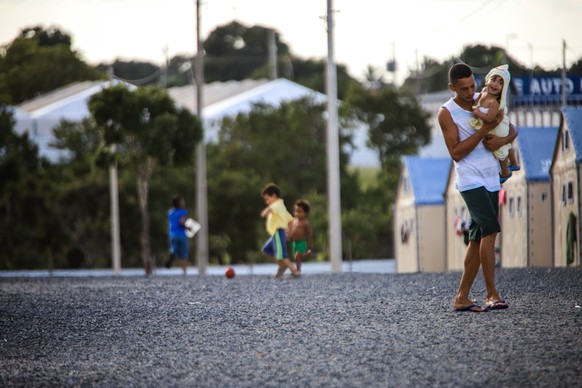 epa07777088 A general view of people at the refugee camp Rondon 3 in Boa Vista, Brazil, that United Nations High Commissioner for Refugees, Filippo Grandi, has visited to get a view of the situation o ...