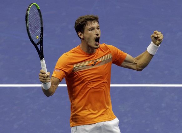 epa08655757 Pablo Carreno Busta of Spain reacts after defeating Denis Shapovalov of Canada at the conclusion of their match on the ninth day of the US Open Tennis Championships at the USTA National Te ...