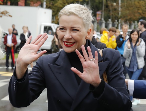 Maria Kolesnikova, one of Belarus&#039; opposition leaders, gestures on the way to the Belarusian Investigative Committee in Minsk, Belarus, Thursday, Aug. 27, 2020. Police in Belarus detained over 50 ...