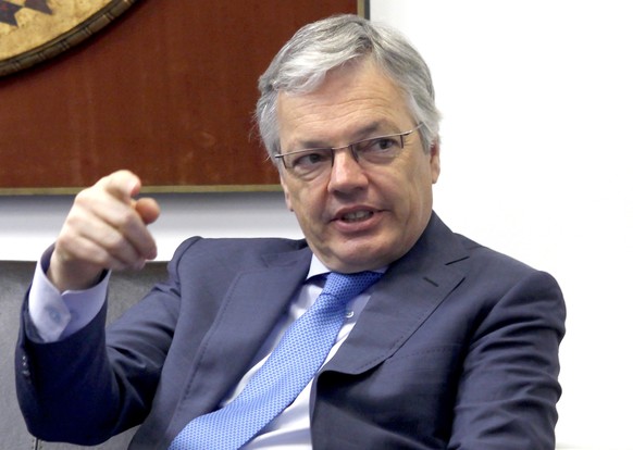 Belgium’s Deputy Prime Minister and Minister of Foreign Affairs Didier Reynders, gestures while talking to Macedonian Foreign Minister Nikola Poposki, during their meeting at the Foreign Ministry in S ...