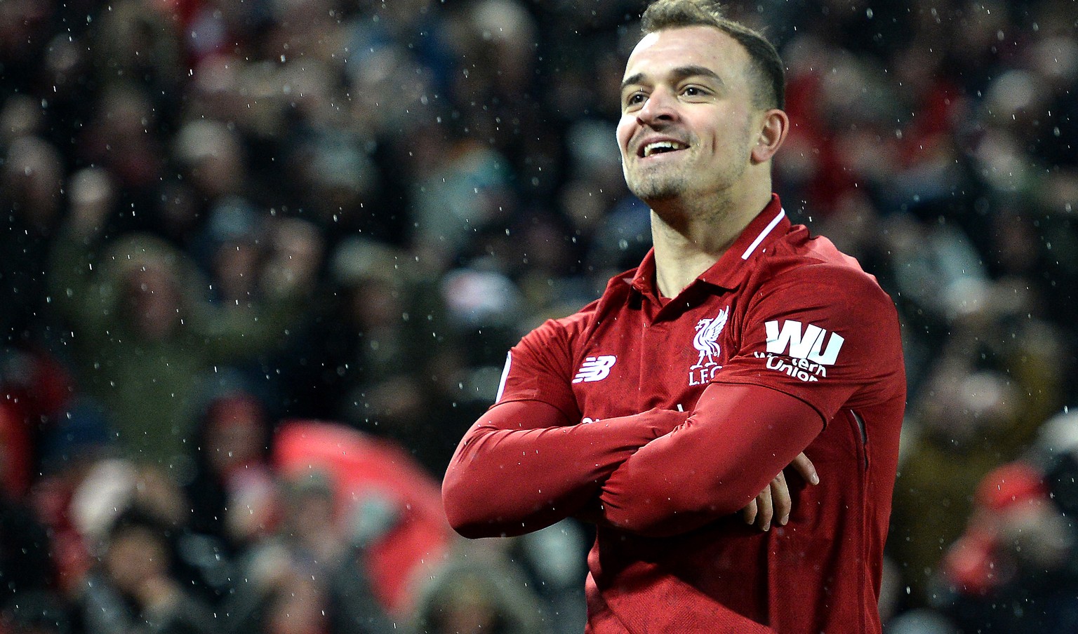 epa07236003 Xherdan Shaqiri of Liverpool celebrates after scoring during the English Premier League soccer match between Liverpool FC and Manchester United FC at Anfield in Liverpool, Britain, 16 Dece ...