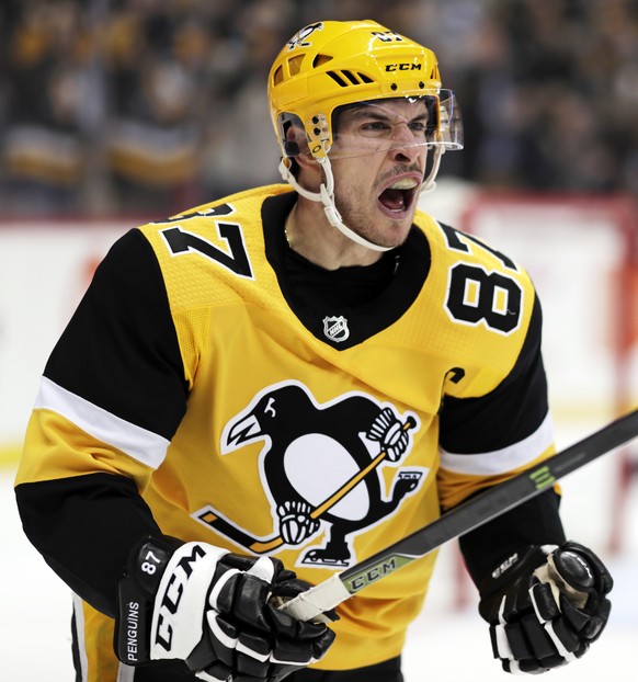 Pittsburgh Penguins&#039; Sidney Crosby celebrates his second goal of the second period during an NHL hockey game against the Washington Capitals in Pittsburgh, Tuesday, March 12, 2019. (AP Photo/Gene ...