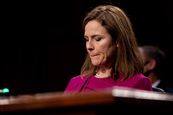 epa08738627 Judge Amy Coney Barrett attends first day of her Senate confirmation hearing to the Supreme Court on Capitol Hill in Washington, DC, USA, 12 October 2020. Barrett was nominated by US Presi ...