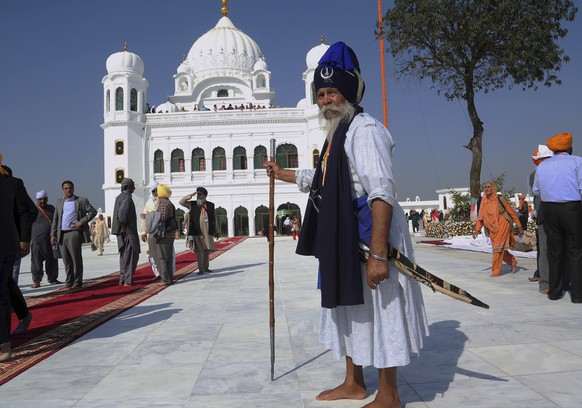 Sikh pilgrims visit the shrine of their spiritual leader Guru Nanak Dev, at Gurdwara Darbar Sahib in Kartarpur, Pakistan. Pakistan&#039;s prime minister Imran Khan has inaugurated a visa-free initiati ...