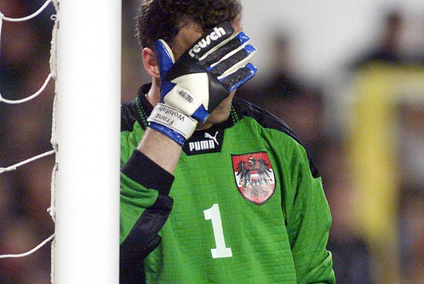 Austrian goalkeeper Franz Wohlfahrt covers his face in dejection during the 2000 European Championship qualifying soccer match Spain vs Austria, Saturday, March 27, 1999, at the Louis Casanova stadium ...